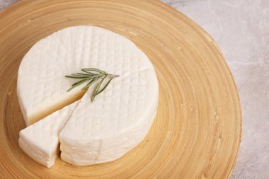 Wheel of brazilian traditional cheese Minas  clipart
