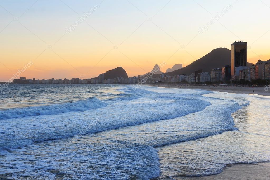 Copacabana beach, mountain Vidigal, Pedra da Gavea, sea in sunse