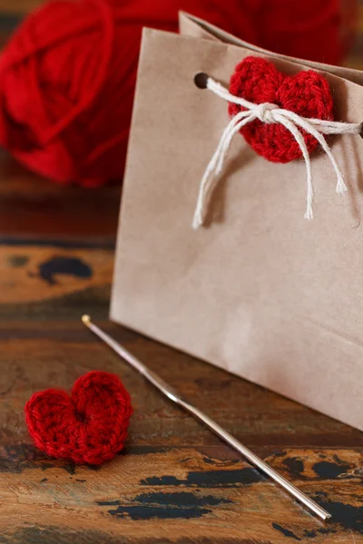 Saint Valentine's day decoration: handmade crochet red heart for — Stock Photo, Image