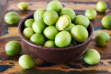 Brazilian fruit Spondias tuberosa (Brazil plum, umbu, imbu) in b