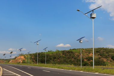 Solar  panel on electric pole on highway, use of Solar energy for lightning, clipart