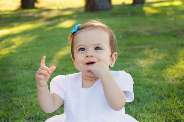 Cute happy baby girl smiling, scratching first teeth — Stock Photo, Image