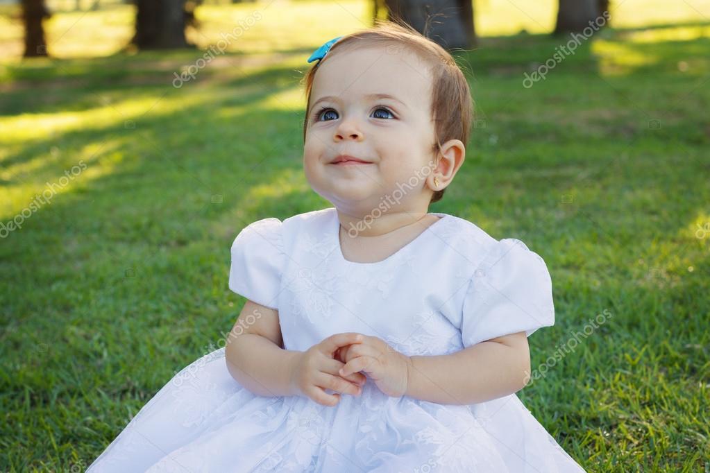 Cute baby girl in white frock best sale