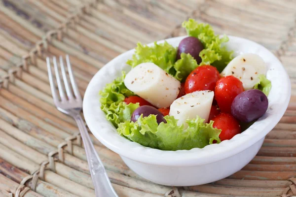 Fresh salad of heart of palm (palmito), cherry tomatos, olives — Stock Image Fresh salad of heart of palm (palmito), cherry tomatos, olives Royalty Free Stock Photos