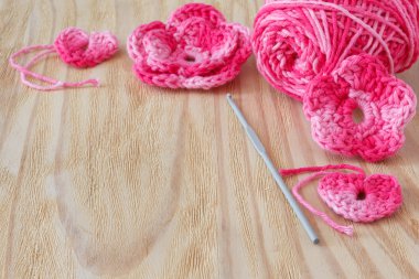 Handmade pink crochet flowers and heart  clipart