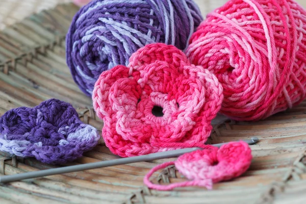 Handmade colorful crochet flowers with skein — Stock Photo, Image