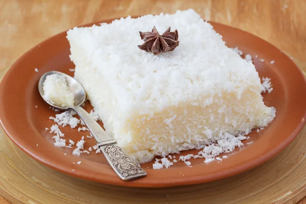 Sweet couscous (tapioca) pudding (cuscuz doce) with coconut — Stock Photo, Image