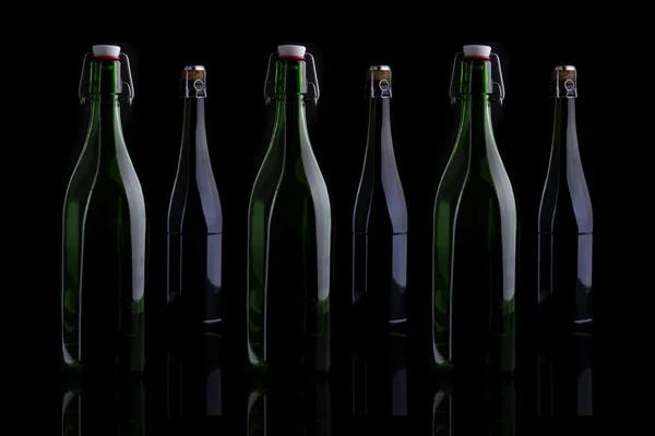 Wine bottle on black — Stock Photo, Image