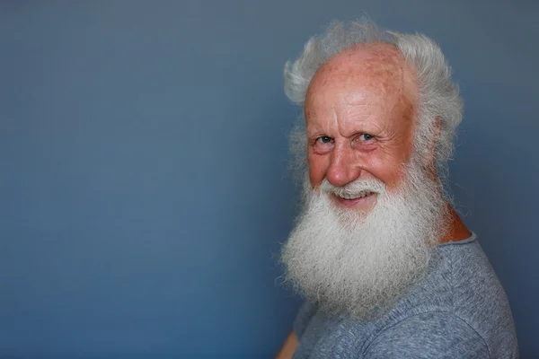 Old man with a long white beard — Stock Photo, Image