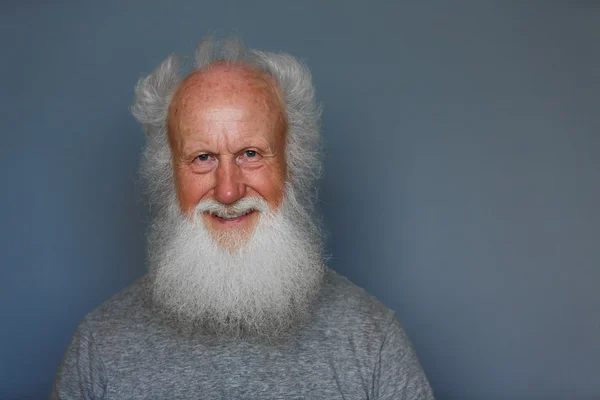 Old man with a long white beard — Stock Photo, Image