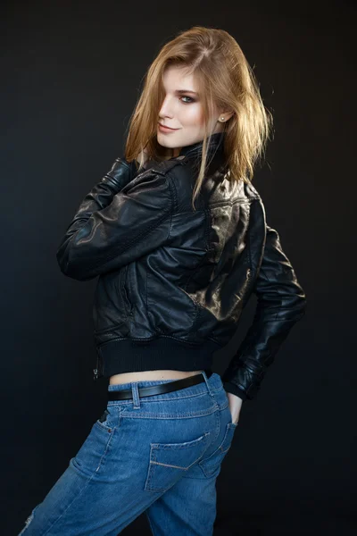 Beautiful sensual sexy girl blonde in a leather jacket — Stock Photo, Image