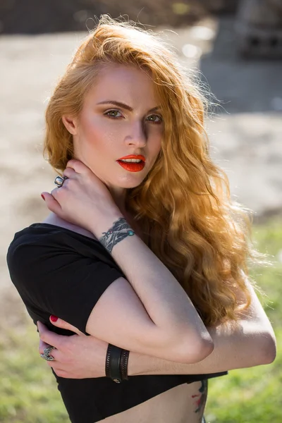 Beautiful fashion model with red hair — Stock Photo, Image