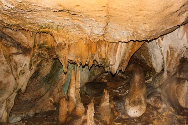 Underground cave with stalactites and stalagmites