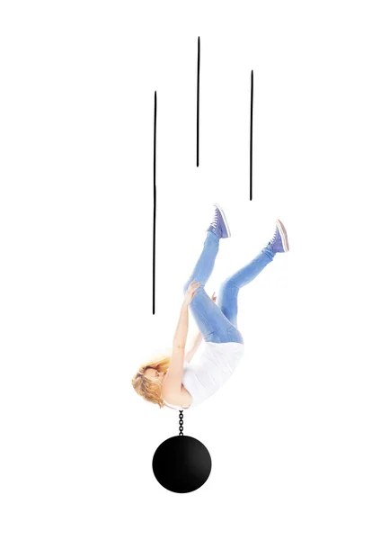 Woman falling with metal ball around her neck — Stock Photo, Image