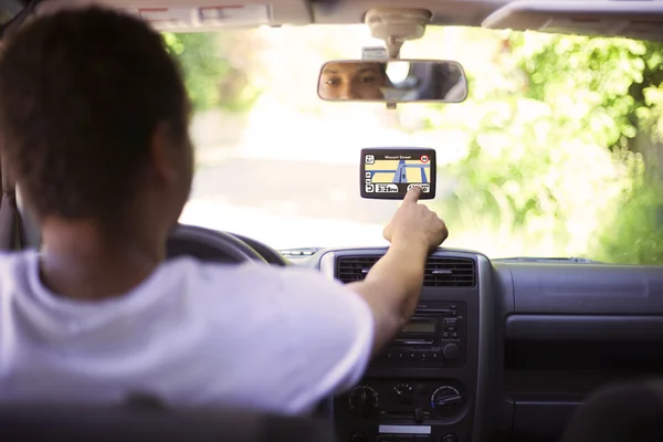 Man driving and changing radio station — Stock Photo, Image