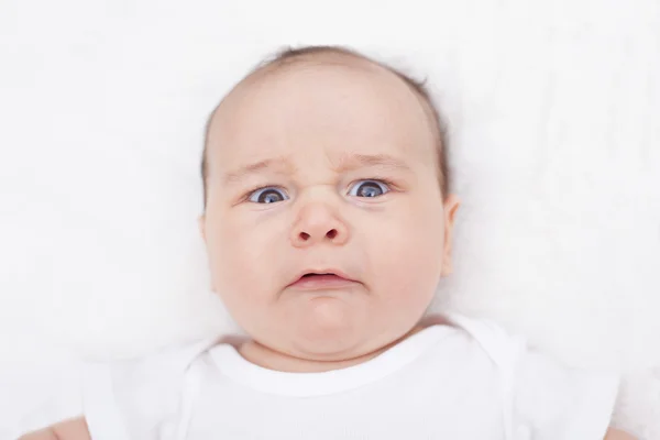 Disgusted or angry baby — Stock Photo, Image