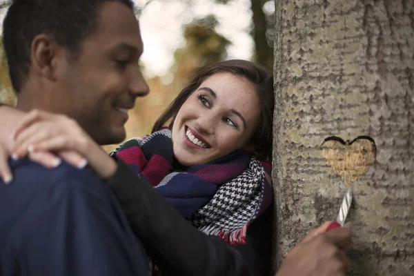In Love Interracial couple in the park — Stock Photo, Image