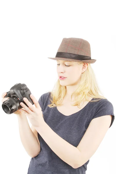 Blonde tourist woman checking her camera — Stock Photo, Image