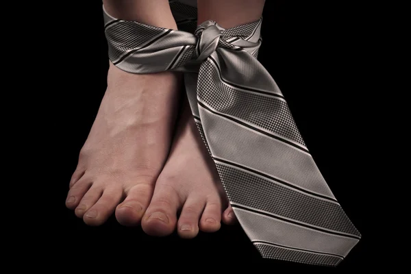 Fötter bundna med en slips — Stockfoto