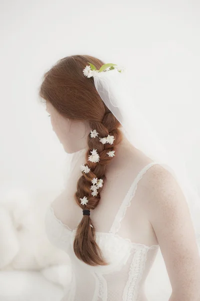 Portrait of Beautiful freckled redhead Bride