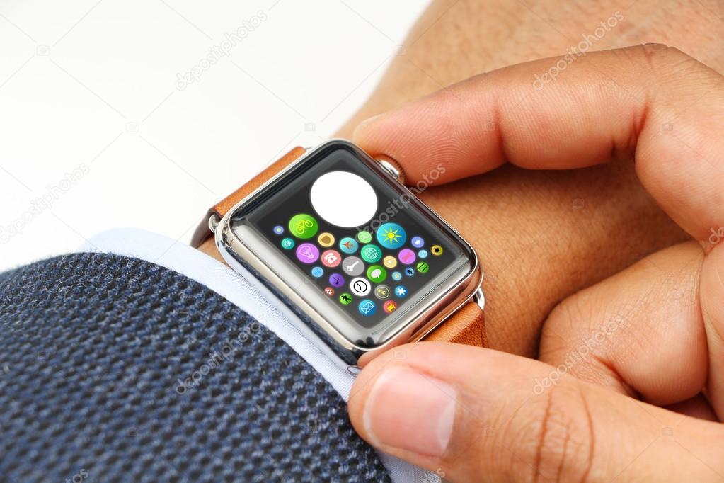 Business' mans hand with a smart watch and space for your logo