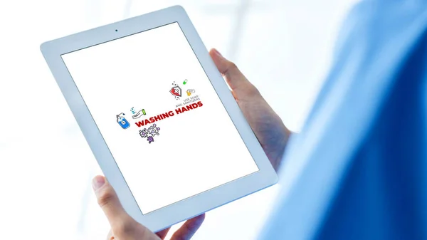 Küresel virüs hakkında görsel bilgi içeren tablet ve bunun nasıl önleneceğine dair öneriler