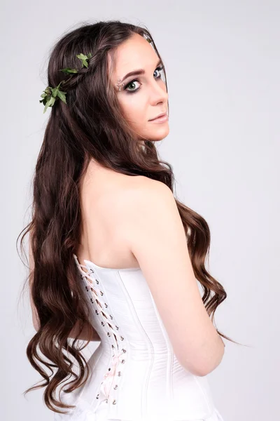 Brunette with long curly hair — Stock Photo, Image