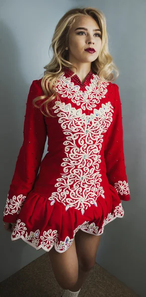 Irish dancer in red costume