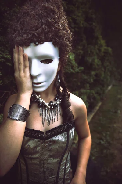 Woman Wearing Corset White Mask Standing Formal Garden — Stok fotoğraf