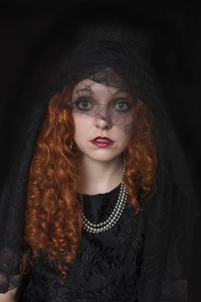 Woman in with black veil — Stock Photo, Image