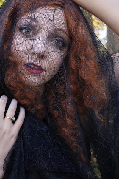 Woman in with black veil — Stock Photo, Image