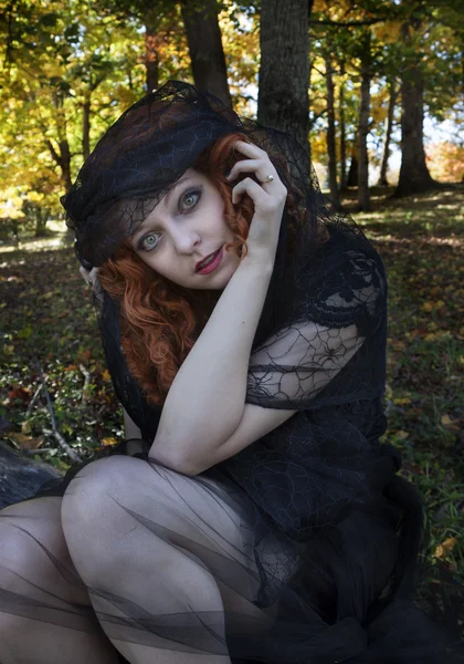 Woman in with black veil — Stock Photo, Image