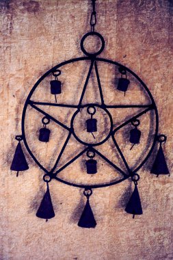 Pentagram with bells clipart