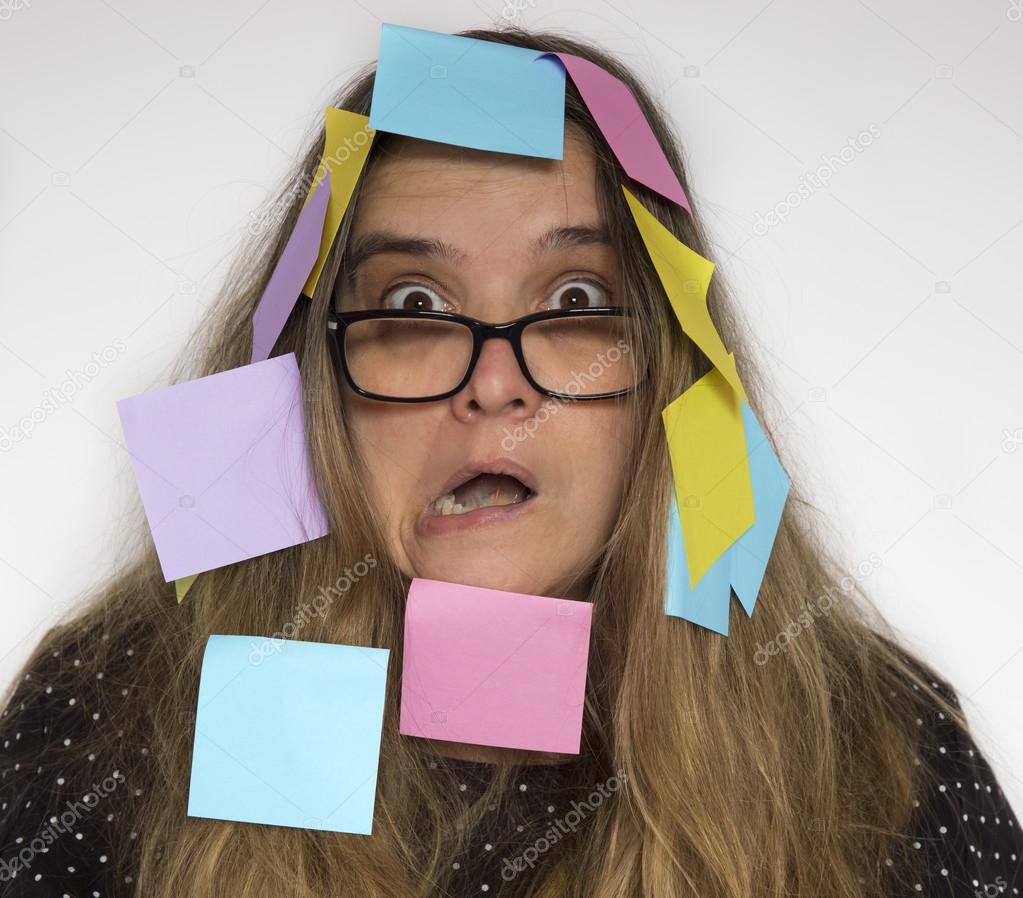 Woman with notes stuck on her