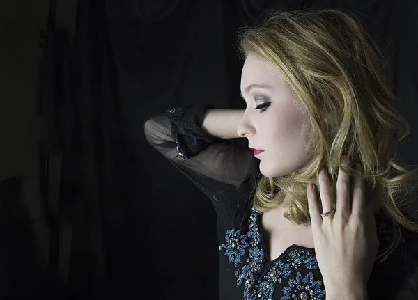 Woman wearing black dress — Stock Photo, Image