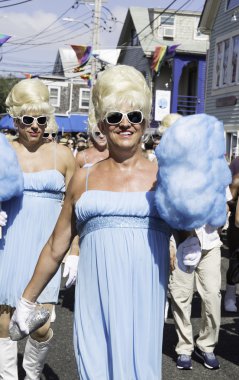 Drag queens walking in the Provincetown Carnival Parade in Provincetown, Massachusetts. clipart