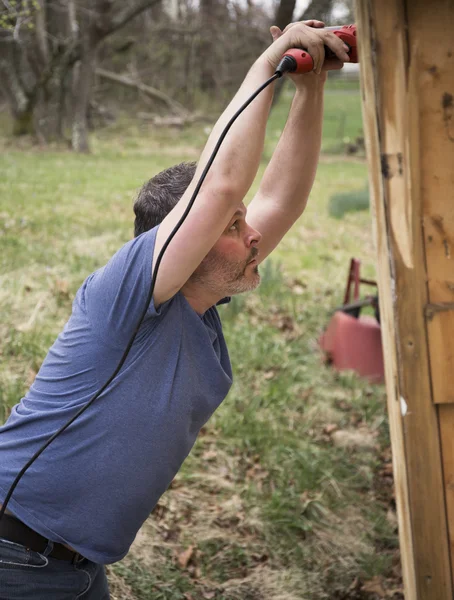 Man working with drill — Stock Photo, Image