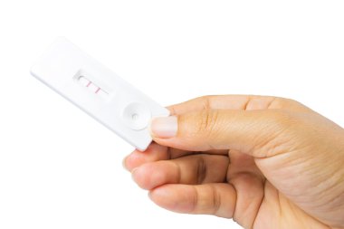 Hamilelik testi üzerine beyaz izole el