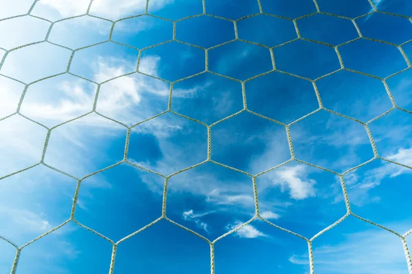 Soccer goal net on blue sky — Stock Photo, Image