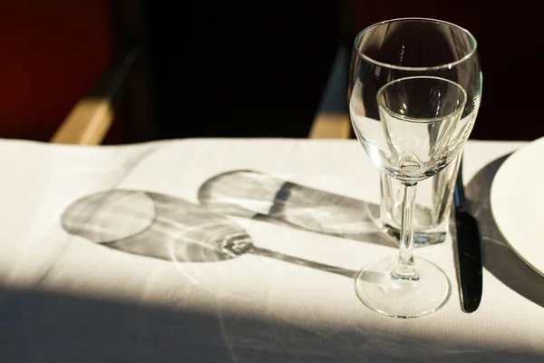 Empty glasses and knife — Stock Photo, Image