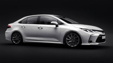 Tula, Rusya. 28 Şubat 2021: Toyota Corolla Sedan 2020 kompakt beyaz araba siyah arka planda izole edildi. 3d oluşturma