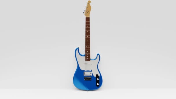 Guitarra Eléctrica Azul Blanca Seis Cuerdas Sobre Fondo Blanco Apoyada — Vídeos de Stock