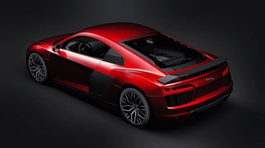 Tula, Russia. May 11, 2021: Audi R8 V10 Quattro 2016 red luxury stylish super sport car on black background. 3d rendering clipart