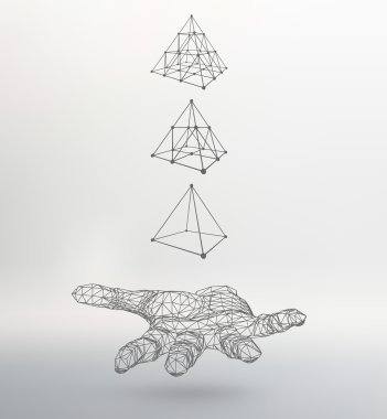 triangle pyramid on the arm. The hand holding a pyramid. Polygon triangle. Polygonal hand. The shadow of the objects in the background.