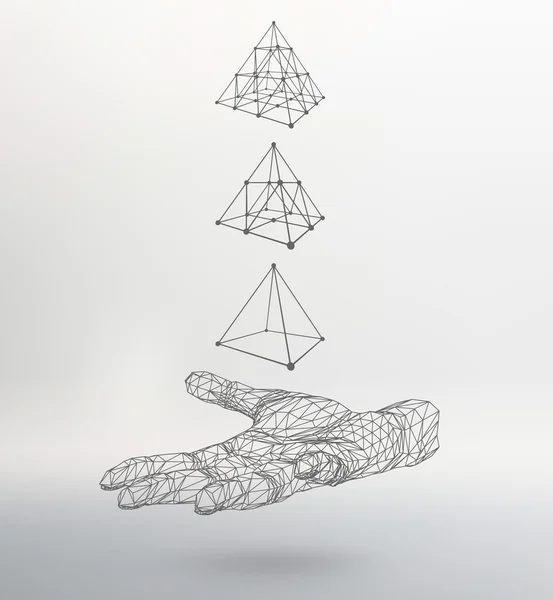 triangle pyramid on the arm. The hand holding a pyramid. Polygon triangle. Polygonal hand. The shadow of the objects in the background.