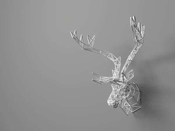 Artificial deer head hanging on the wall. Polygonal head of a deer. Deer from the three-dimensional grid. The object of art on the wall. Volume model. Meshwork. — Stock fotografie