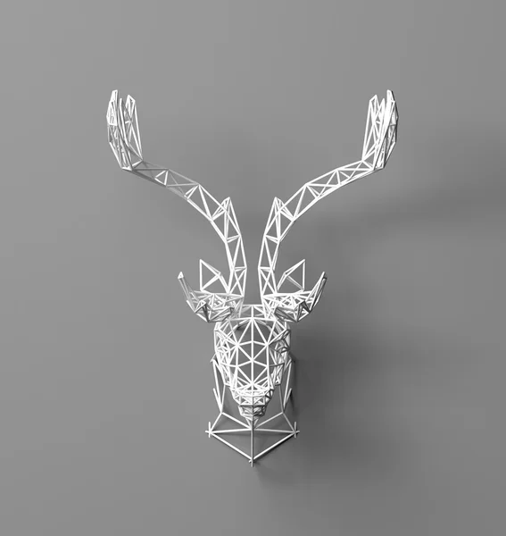 Artificial deer head hanging on the wall. Polygonal head of a deer. Deer from the three-dimensional grid. The object of art on the wall. Volume model. Meshwork. — Stock fotografie