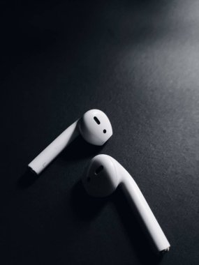 Airpods wallpapers in black background placed in zigzag. clipart
