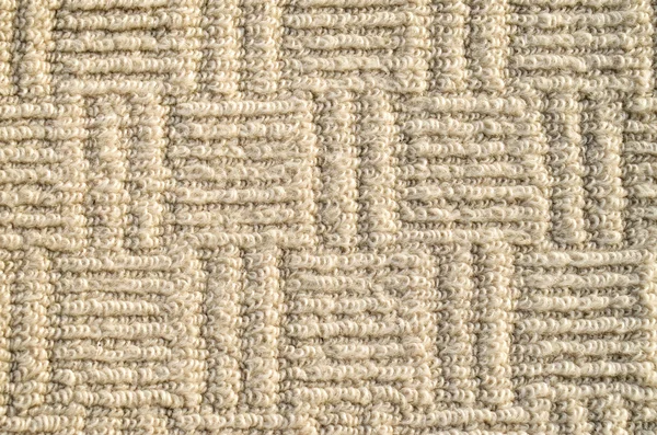 Zbliżenie beżowy dywan ozdobnych — Zdjęcie stockowe