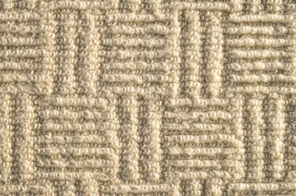 Closeup of beige ornamental carpet — Stock Photo, Image